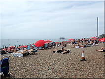 TQ3003 : A crowded Brighton beach by Marathon