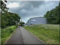 Leafy start to a footpath and cycleway, Trident Park, south Leamington