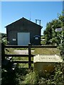 Stile and water services building, Tongue End Cross