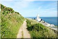 NZ9210 : The England Coast Path at Whitby Lighthouse by Jeff Buck