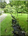 NM7417 : Seil - Ellenabeich - An Cala - Stream through garden by Rob Farrow