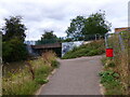 Towpath approaching bridge 64 over the Stratford-upon-Avon Canal