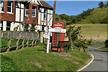 TR1439 : Signpost and telephone box by N Chadwick