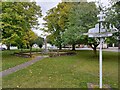 Village sign and war memorial, London Road, Great Glen