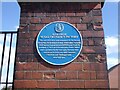 Plaque on a gatepost on Austhorpe Road