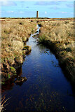 NY9546 : Water course near Sikehead Lead Mines by Andrew Curtis