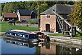 Narrowboats and restored crane at Burbage Wharf