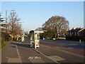 Bus stop and shelter on Castle Lane West (A3060)