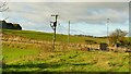 Disused railway line crosses minor road by Balmitchell farm