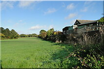 TM5397 : Field to the left of the former railway track by Adrian S Pye