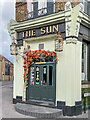 TQ2764 : Door, The Sun by Ian Capper