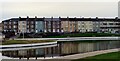 Newcomen Terrace seen across Coatham Boating Lake, Redcar