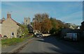 SE3277 : The village street approaching the church, Wath by Humphrey Bolton
