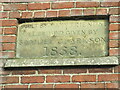 Stone  plaque  on  derelict   chapel  front  Dunnington