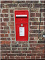 Postbox  in  cottage  wall  onto  pavement.  George  VI