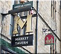 Signs for The Market Tavern and Durham Markets