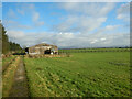 SD7657 : Track past Heath Farm's barn by Andy Waddington