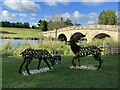 SP4415 : Horseshoe sculptures by the River Glyme by Jonathan Hutchins