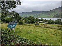 NY1016 : A sign for Wild Wool Barn above Ennerdale Water by David Medcalf