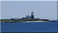 NU2904 : Coquet Island and Lighthouse by Sandy Gerrard