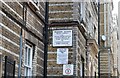 Old sign on the Peabody Estate, Clerkenwell