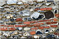 TL8925 : Great Tey, St. Barnabas Church: Reused Roman bricks and tiles in the west wall by Michael Garlick