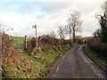 Llwybr yn gadael yr heol / Path exiting the road