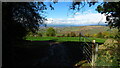 View through gate looking NW from Winchcombe Way from near Gotherington Farm