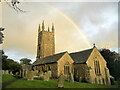 SX3379 : St Briochus's Church and a rainbow by Paul Barnett