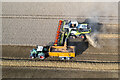 SJ5307 : Combine harvester and tractor harvesting a cereal crop by TCExplorer