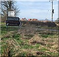 Direction signs on grass, South Gloucestershire