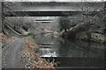 SU8353 : Basingstoke Canal passing beneath  roundabout at Norris Bridge by David Martin