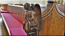 TM0458 : Stowmarket, St. Peter and St. Mary's Church: Bench end 3 by Michael Garlick