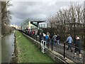 Football supporters heading to the Lincoln City v Peterborough United match on 18 March 2023