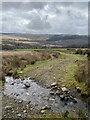 Footpath crossed by a stream