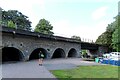 Railway viaduct running over a River Thames backwater