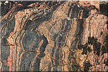 NH7459 : Leucogranitic rock near Scart Craig,  Rosemarkie by Julian Paren