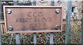 NY5563 : Bridge name and date sign for Abbey Bridge by Roger Templeman