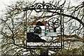 TG1106 : Wramplingham: Village sign situated in the mill pond by Michael Garlick