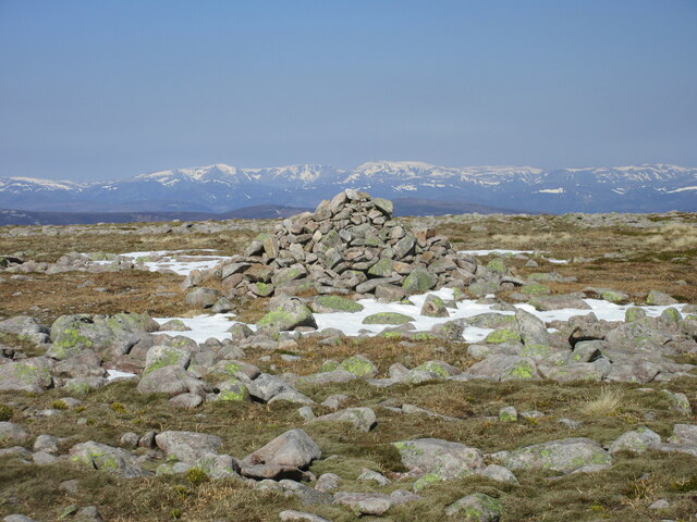 Cairn on Fafernie Looking north to the cairn on Fafernie, with the Alpine-like Cairngorms on the horizon.