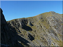 SH6359 : Rock buttresses and scree below the summit of Y Garn by Richard Law