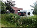 Delapedated shed and caravan near the Annandale Way