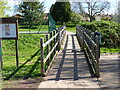 Bridge over Barbourne Brook with tennis courts