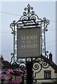 Sign for the Hand in Hand public house