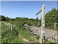 A drooping footpath sign