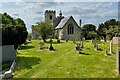 TL4238 : St Swithun's and its churchyard by Philip Jeffrey