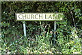 TM0179 : Church Lane sign by Geographer