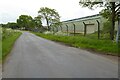 Country road passing a depot