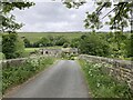 Isles Bridge with cottages beyond