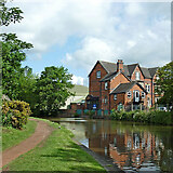 SJ8934 : Canal and St Dominic's in Stone, Staffordshire by Roger  D Kidd